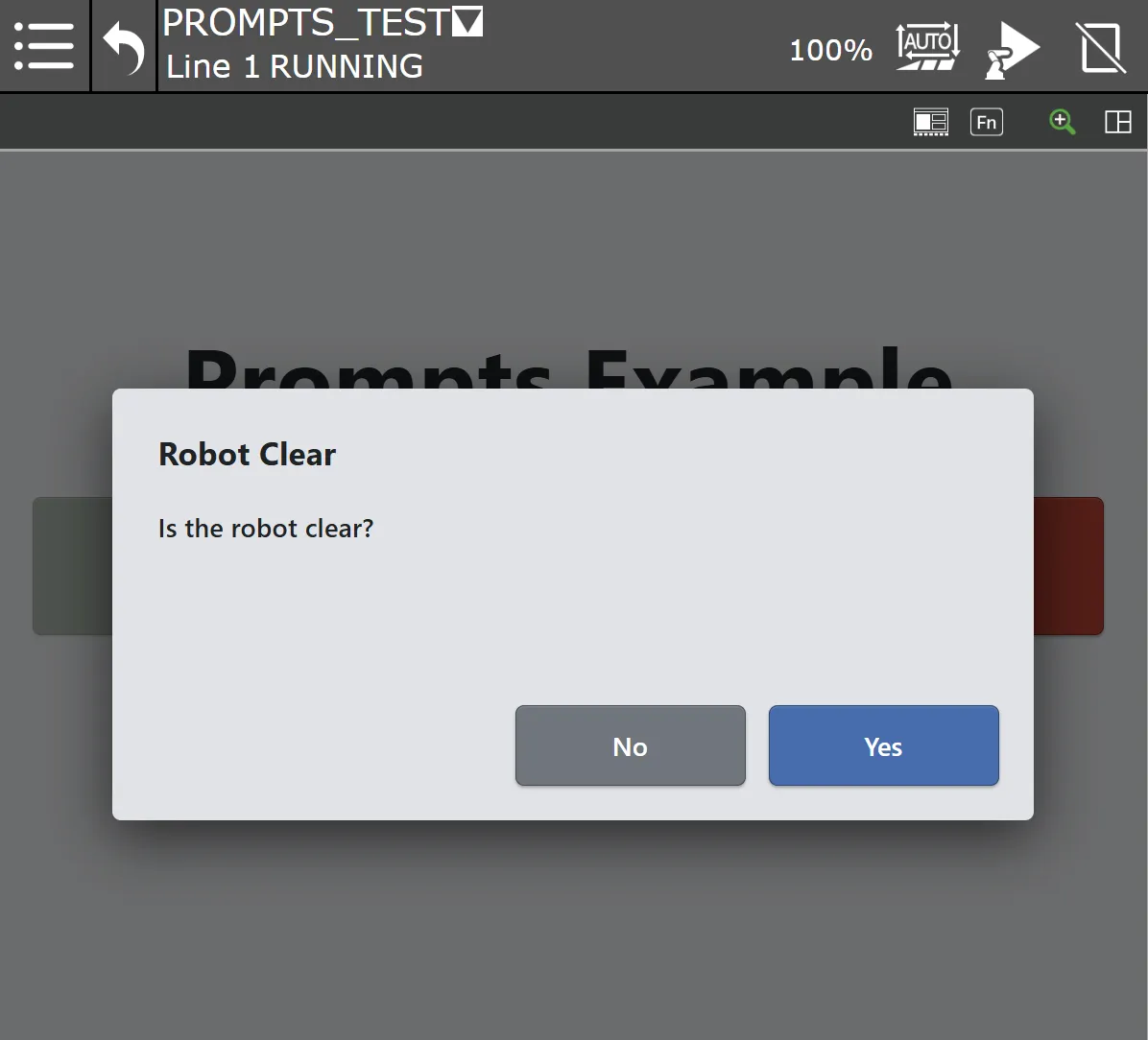 A Yes/No prompt titled Robot Clear asking “Is the robot clear?”, with No and Yes buttons, over a dimmed screen on the pendant.